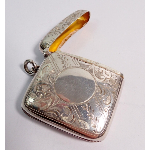 345 - A silver vesta case with engraved decoration,  Birmingham 1919 by Burrows & Son,