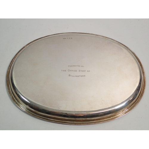 350 - An oval silver salver engraved and dated 1957, 27cm wide, 457g