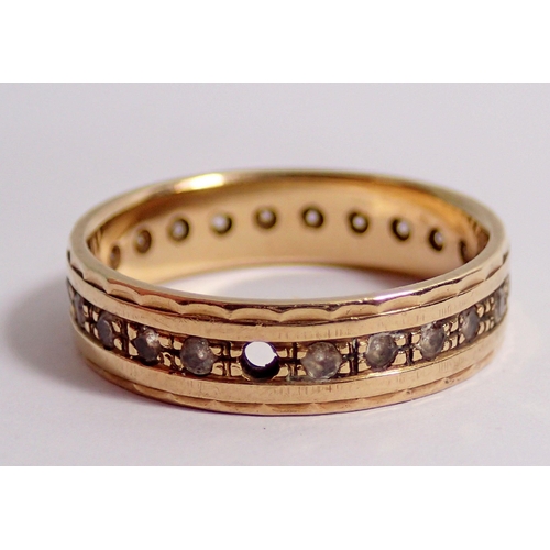 359 - A 9ct gold eternity ring set white stones, one stone deficient, 2.8g, size M to N