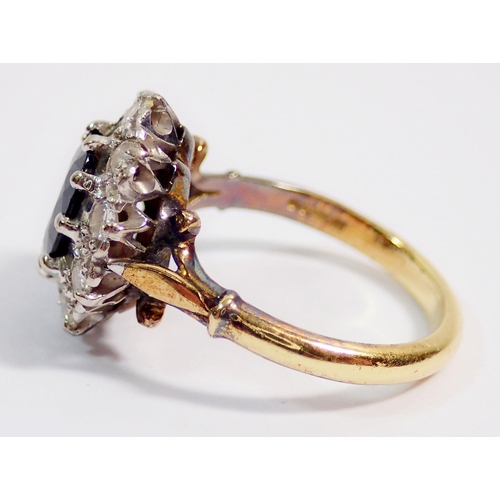 362 - An 18 carat gold sapphire and diamond cluster ring, sapphire 8 x 6mm, size N, 5.2g - boxed