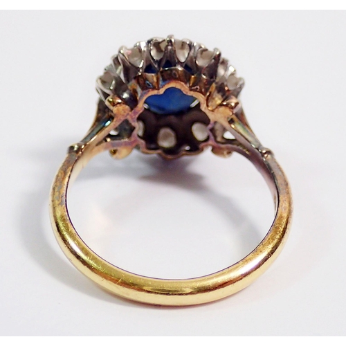 362 - An 18 carat gold sapphire and diamond cluster ring, sapphire 8 x 6mm, size N, 5.2g - boxed