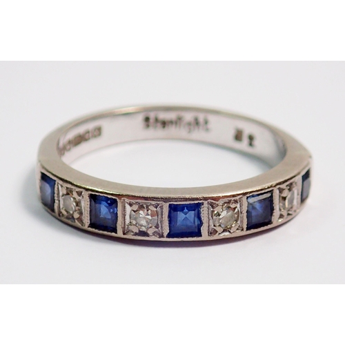 367 - An 18 carat white gold diamond and sapphire half eternity ring, size L, 4g