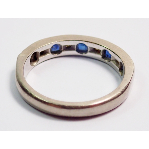 367 - An 18 carat white gold diamond and sapphire half eternity ring, size L, 4g