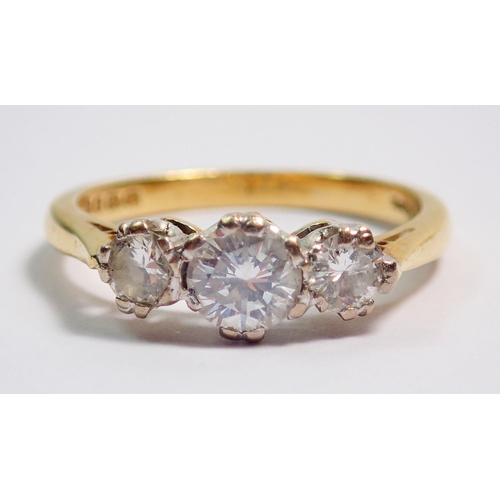 368 - An 18 carat gold three stone diamond ring, size J, 2.5g