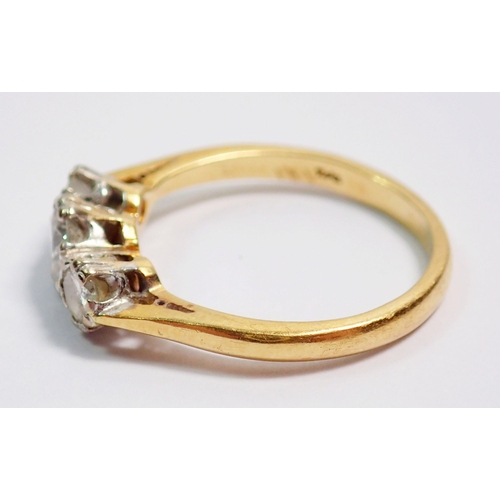 368 - An 18 carat gold three stone diamond ring, size J, 2.5g