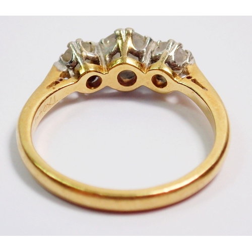 368 - An 18 carat gold three stone diamond ring, size J, 2.5g