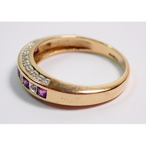 373 - A 9 carat gold ring channel set amethysts and diamonds on a diamond set band, size L-M, 2.5g