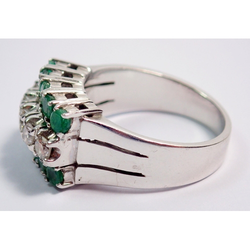 374 - A 14k white gold ring set five diamonds flanked by ten emeralds, size N, 6.8g