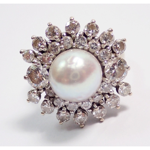 376 - An 18 carat white gold pearl and diamond large cocktail cluster ring, size N, 7.6g