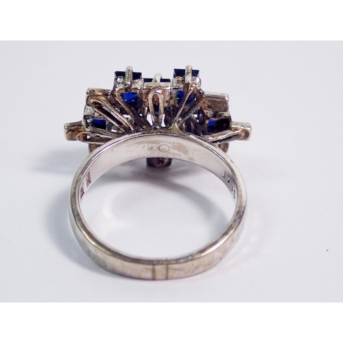 378 - A modernist white metal ring set geometric stepped arrangement of sapphires and diamonds, size L to ... 