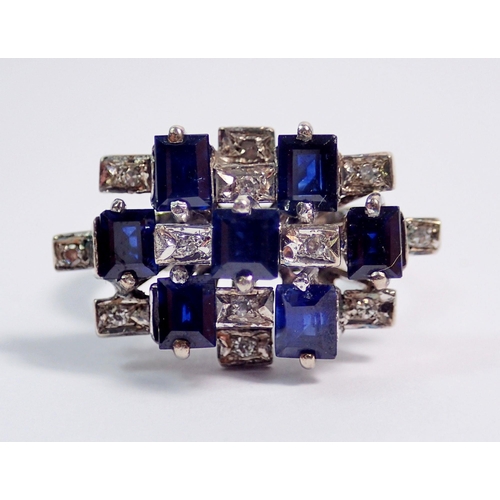 378 - A modernist white metal ring set geometric stepped arrangement of sapphires and diamonds, size L to ... 