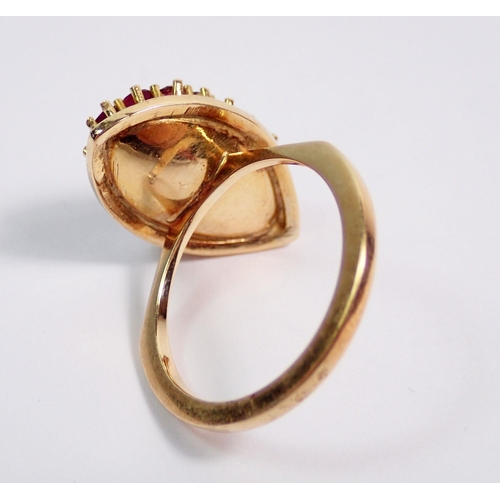 379 - A gold ring of marquise form set rubies, size O, 7g, unmarked but tested as 18 ct gold, 2.3 x 1.2cm