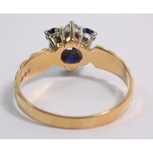 388 - An 18 carat gold diamond and sapphire cluster ring, size N, 2.7g