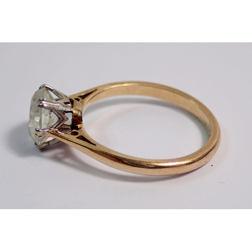 396 - A 9 carat gold and platinum ring set single white stone, size L, 2.3g