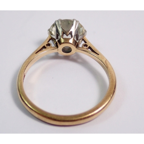 396 - A 9 carat gold and platinum ring set single white stone, size L, 2.3g