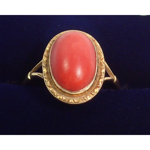 397 - An 18 carat gold coral set ring, size N, 2.6g