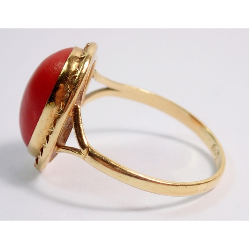 397 - An 18 carat gold coral set ring, size N, 2.6g