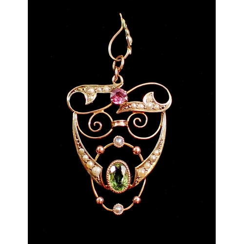 427 - An Edwardian 9 carat gold openwork pendant set peridot, seed pearls and amethyst in suffragette colo... 