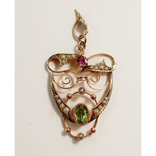 427 - An Edwardian 9 carat gold openwork pendant set peridot, seed pearls and amethyst in suffragette colo... 