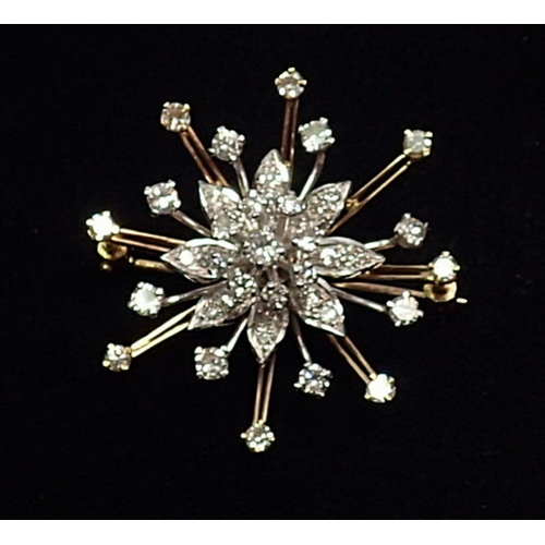 430 - A fine quality yellow and white gold star burst brooch set diamonds, 4cm diameter, 14.8g (unmarked)