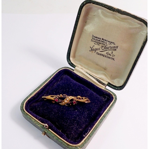 437 - An Edwardian 15 carat gold brooch set amethyst and seed pearls, 4.3cm wide, - boxed, 2.3g