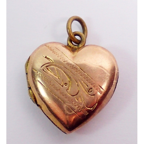 441 - A 9 carat gold front and back small heart form locket, 2.3g