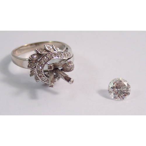 462 - An 18 carat white gold vintage ring with single claw set diamond (approx 1ct) in 'swirled' setting (... 