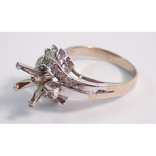 462 - An 18 carat white gold vintage ring with single claw set diamond (approx 1ct) in 'swirled' setting (... 