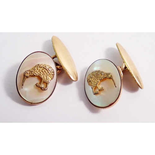 482 - A pair of 9 carat gold and mother of pearl kiwi New Zealand cufflinks, 5.6g