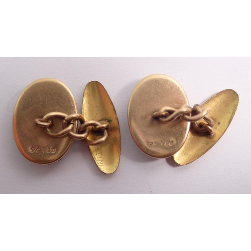 482 - A pair of 9 carat gold and mother of pearl kiwi New Zealand cufflinks, 5.6g