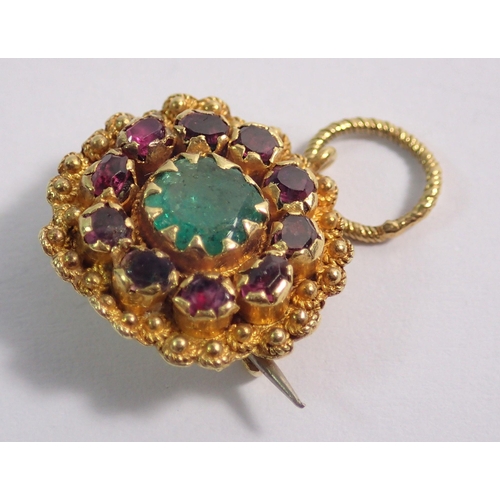 488 - An early 19th century yellow metal small brooch or pendant set emerald within ruby surround, 1.2cm d... 