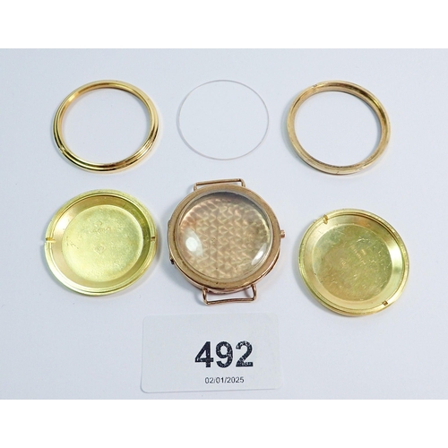 492 - Two 18 carat gold watch cases, 19g, a 9 carat gold one with glass, 9.8g total weight plus two yellow... 