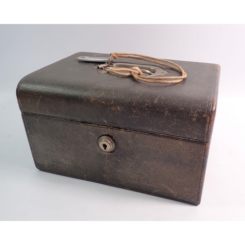 536 - A Victorian leather jewellery box with two lift out trays, key and contents of jet belt etc. 13 x 23... 