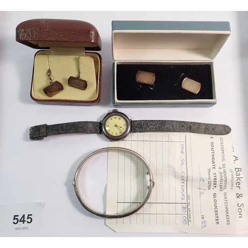 545 - A silver watch, two silver pairs of cufflinks and a silver bangle