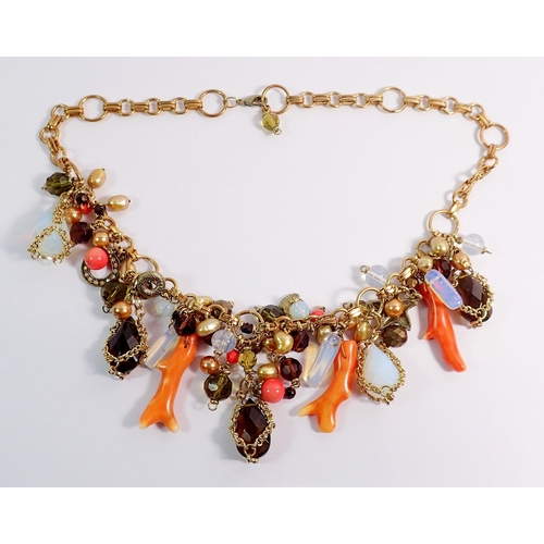 547 - An American costume necklace with multiple pendant beads, moonstones, freshwater pearls, 'coral' etc... 