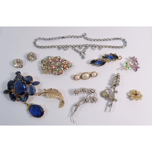 549 - A group of paste costume jewellery plus a Christian Dior brooch