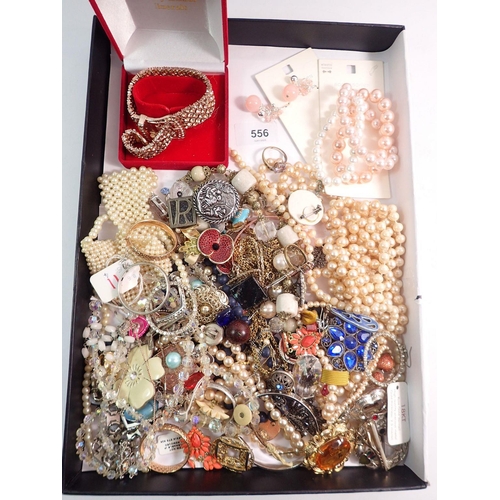 556 - A box of costume jewellery