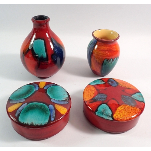 62 - Two Poole Volcano vases and two trinket boxes, 11cm diameter