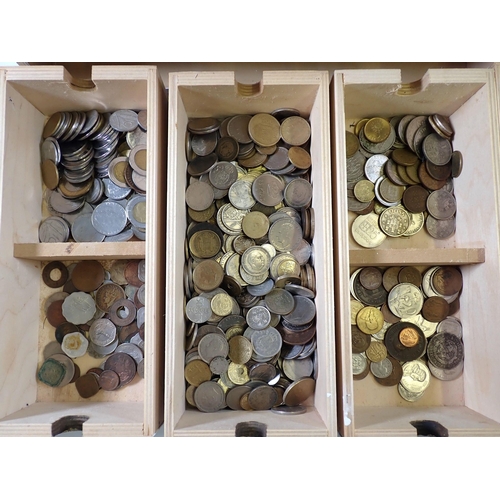 622 - A nine drawer wooden box with a selection of world coins including Channel Islands, India, Malta etc