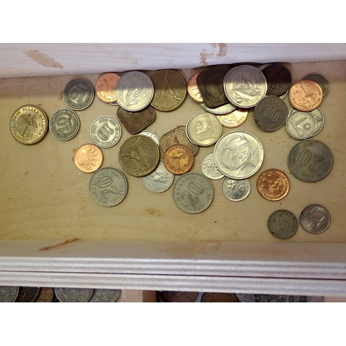 622 - A nine drawer wooden box with a selection of world coins including Channel Islands, India, Malta etc