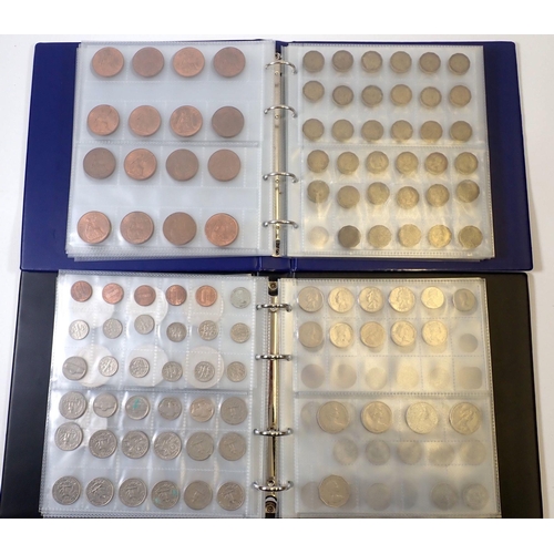 633 - Two coin albums containing numerous world coinage, mainly British decimal and pre-decimal, Cond: F-V... 