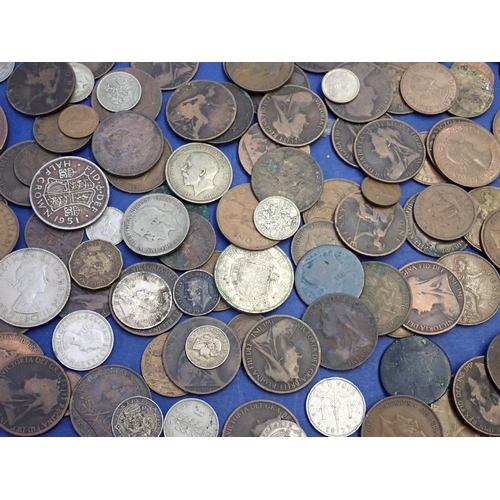 650 - A miscellaneous group of British and world coins including some silver content George V florins etc ... 