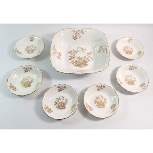 68 - A Spode 'Louvain' gilt and white fruit bowl, 23cm and six small dishes