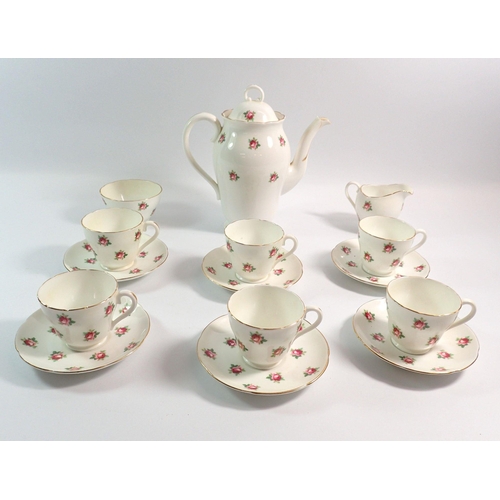 69 - An Adderley coffee set printed roses comprising six cups and saucers, coffee pot, milk and sugar - a... 