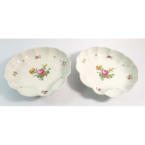 73 - A pair of 19th century shell form dessert dishes, 22cm wide painted roses, with Vienna beehive style... 