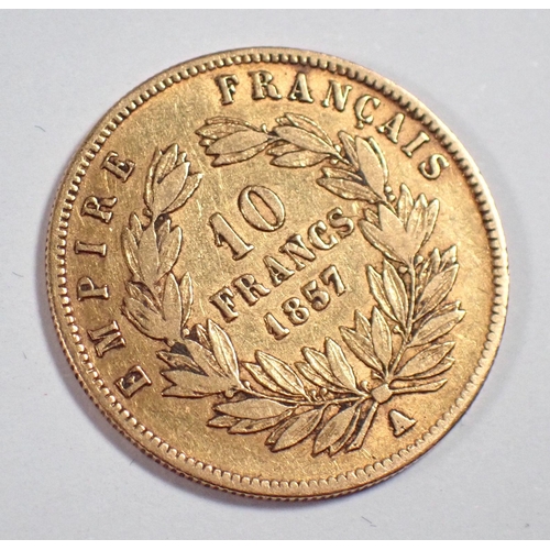 804 - A Napoleon III ten francs gold coin 1857, Cond F-VF, 3.1g