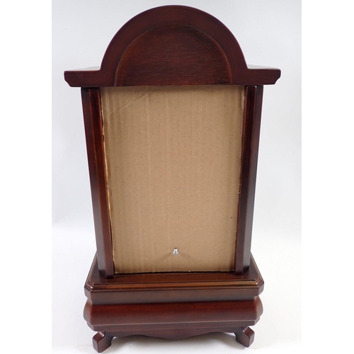 899 - A mahogany finish 8 day skeleton clock striking the hours on a bell, lacking original glass panel ba... 