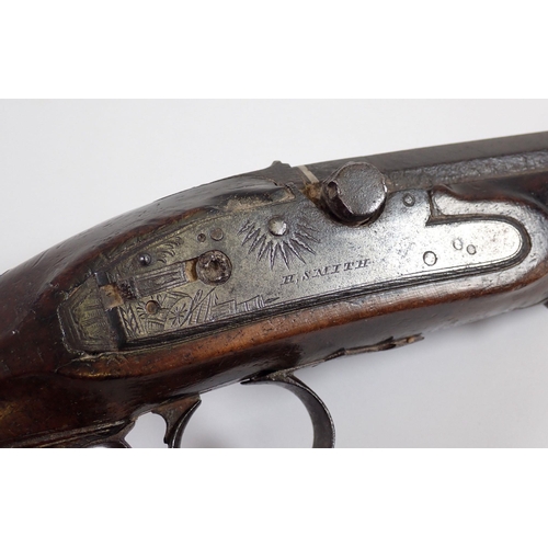 910 - An 18th century style flint lock pistol, the lock plate engraved H Smith, 23cm long