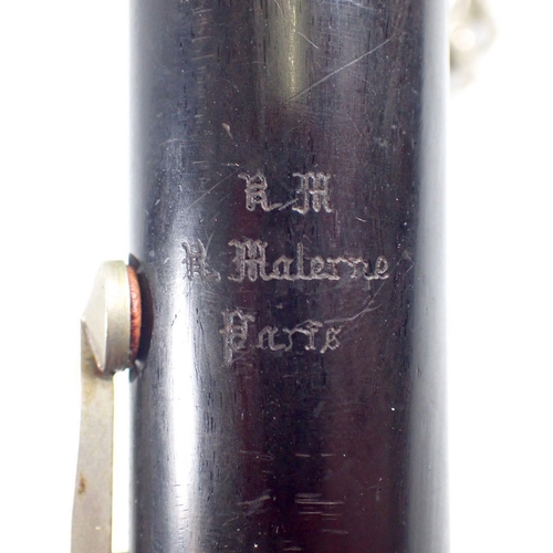 913 - An old brass trumpet and a Malerne of Paris clarinet, both cased