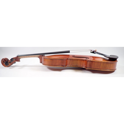 915 - An early 20th century hand made violin in fitted case, 14